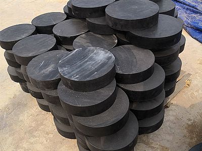 武宁县板式橡胶支座由若干层橡胶片与薄钢板经加压硫化